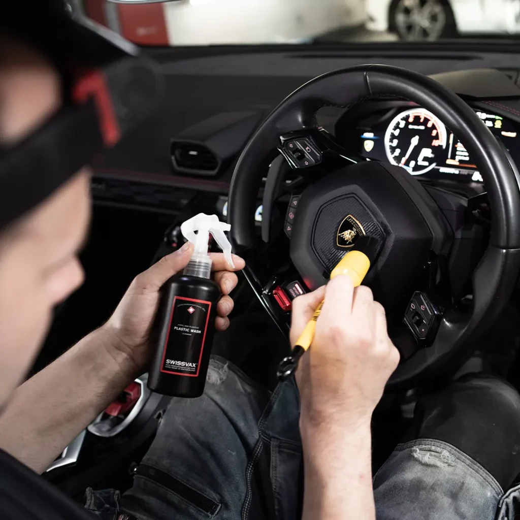 Detailer polishing a car at Auto Detail Valeting studio, Dublin